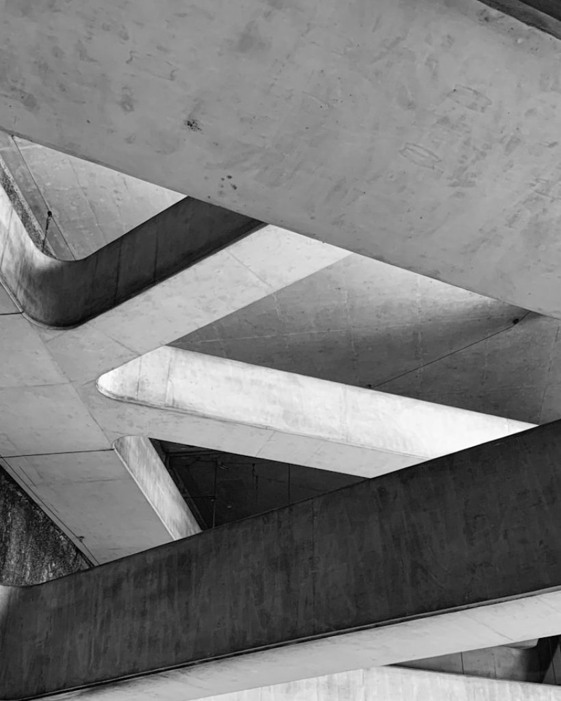 a black and white photo of a concrete structure